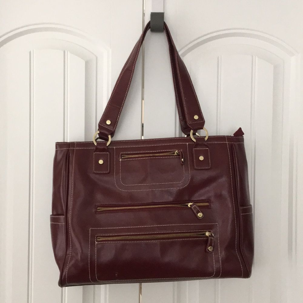 Burgundy laptop bag with many pockets